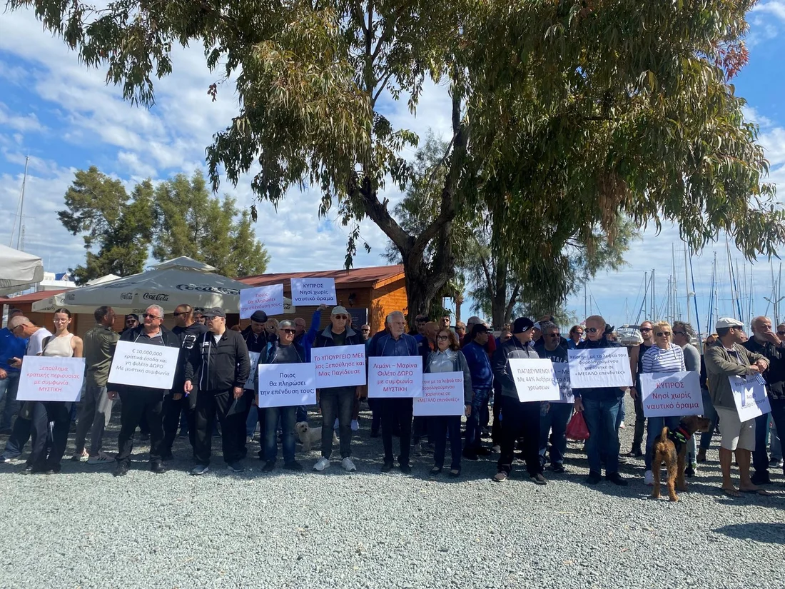 Boat proprietors of larnaca marica holding protest papers